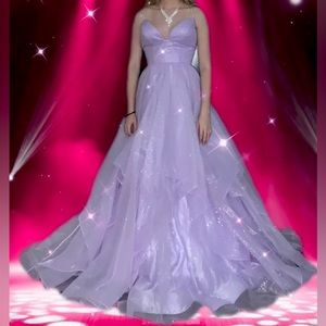 A beautiful pixie style periwinkle colored dress.